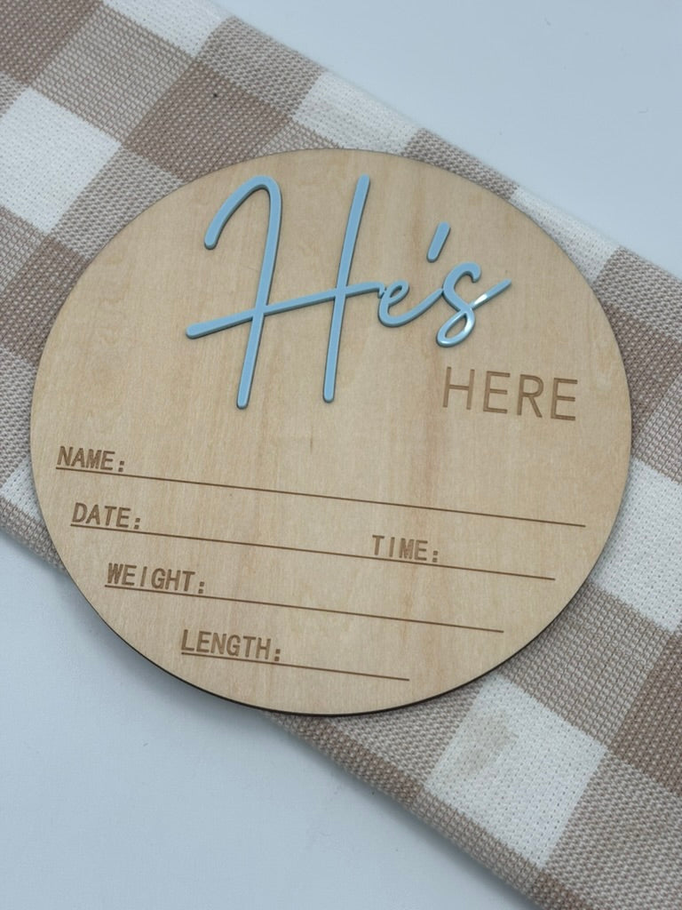 He's Here sign